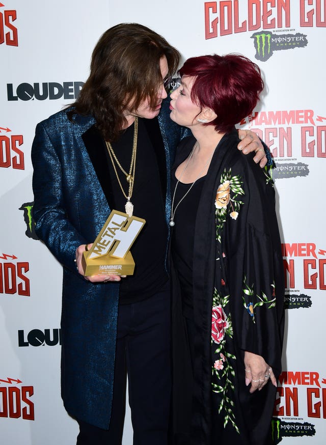 Ozzy Osbourne with wife Sharon and his Golden God award