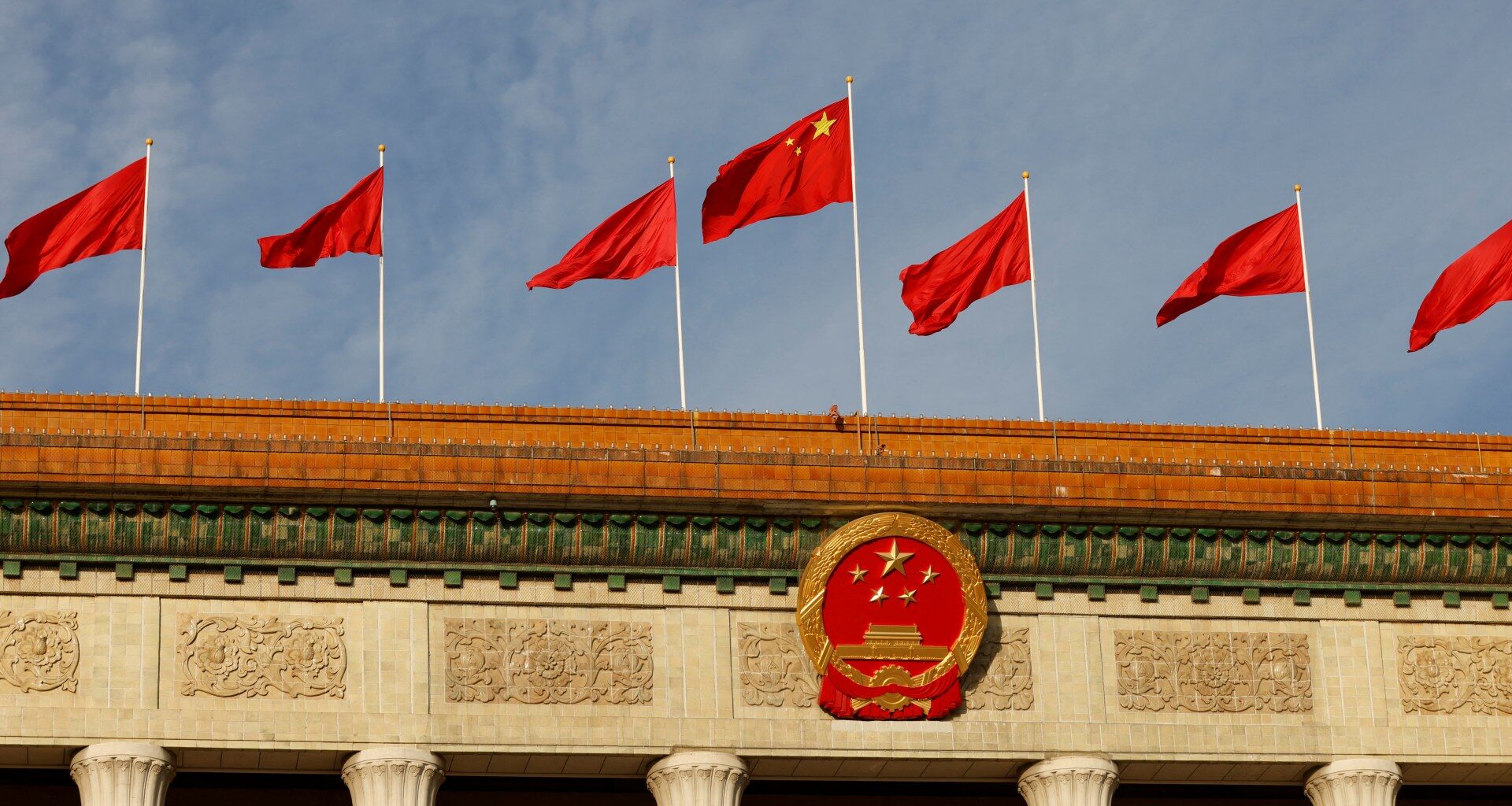 US government employee barred from leaving China, Washington says | News