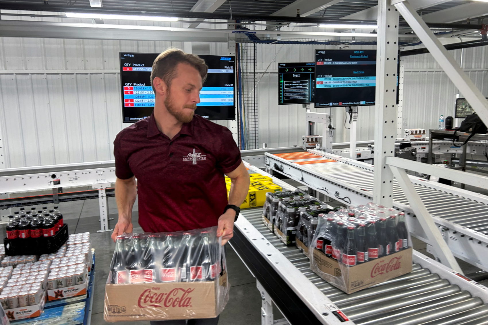 Coca-Cola Consolidated senior logistics manager Jonathan Ryen loads cases of cane sugar-based Coca-Cola from Mexico for di...