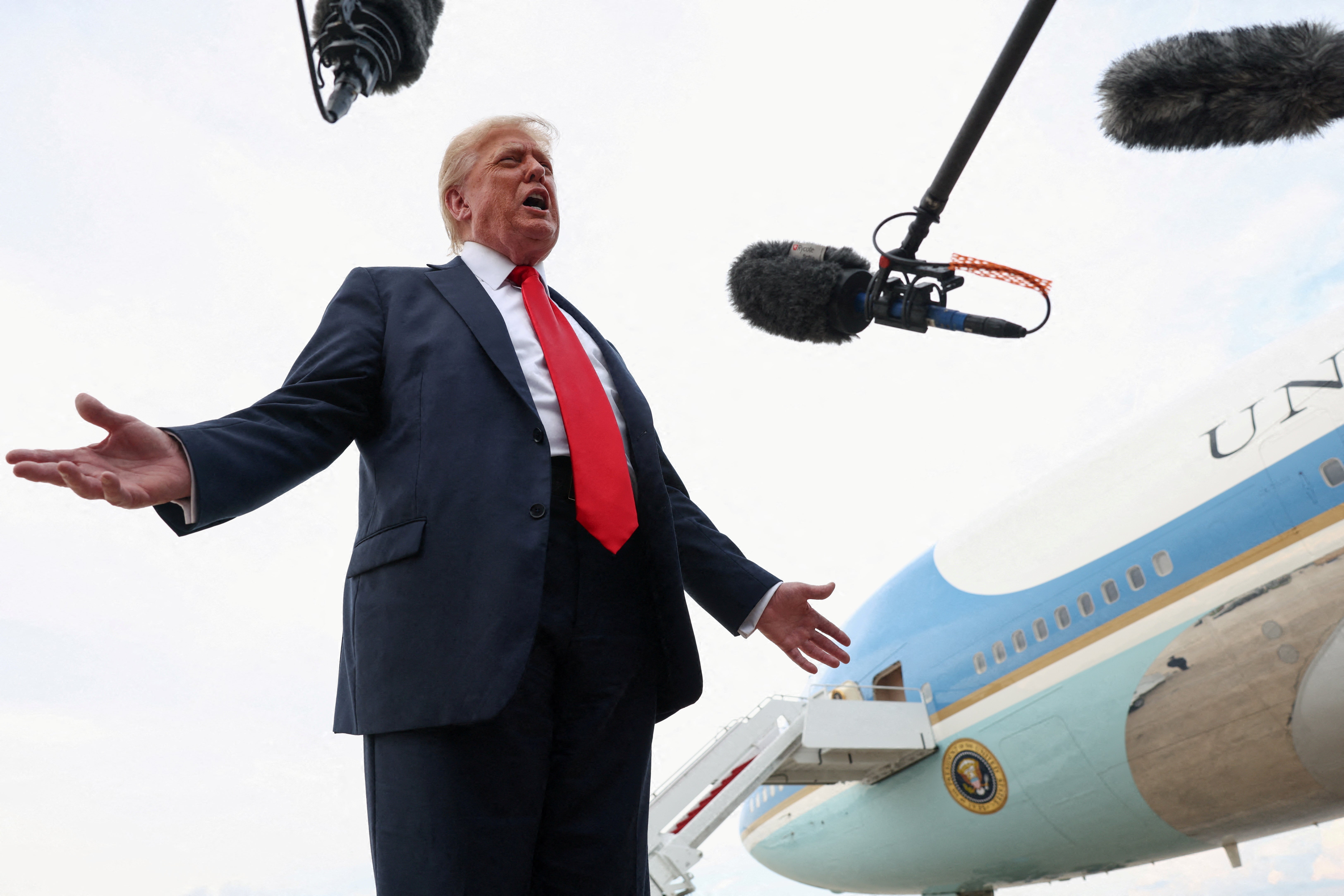 U.S. President Donald Trump speaks with the media after attending the FIFA Club World Cup final upon his arrival at Joint Base Andrews, Maryland, U.S, July 13, 2025.