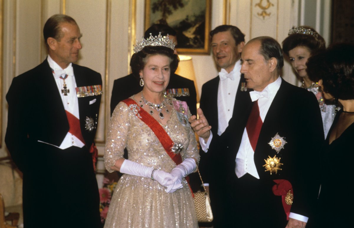 Queen Elizabeth II attends a return dinner hosted by President François Mitterrand in London on October 25, 1984 (PA Images/Alamy)