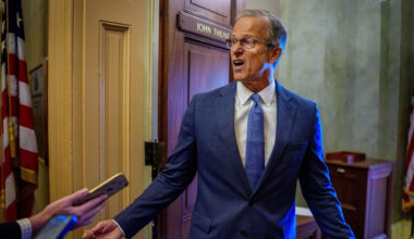 Senate Majority Leader John Thune (R-SD) speaks to reporters as he returns to his office from the Senate Chamber.
