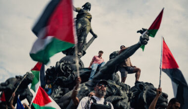 People on the Triomphe de la Republique at the Nation square with Palestine flags during a demonstration in support of Palestine called by several French trade unions in Paris France.