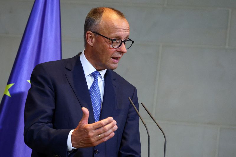 Merz says Berlin still considering stake in TenneT's German business