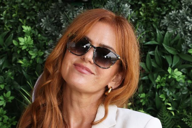 Isla Fisher brings mystery new man to Wimbledon after Sacha Baron Cohen divorce