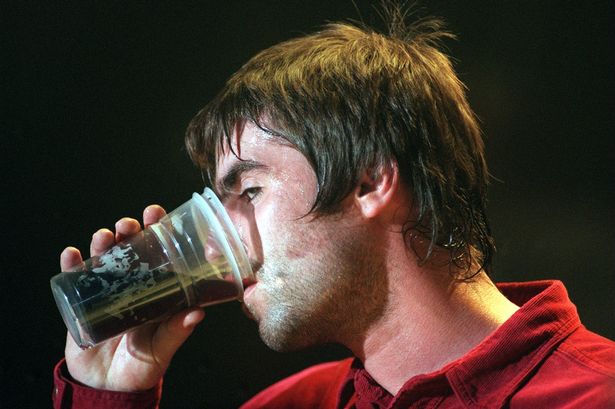 Liam Gallagher enjoying a pint