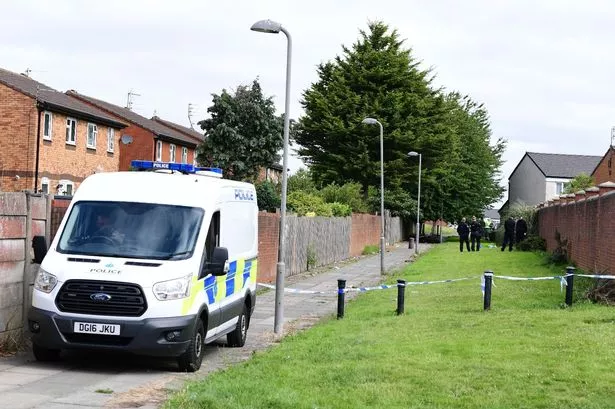 Police at the scene on Calder Road in Everton