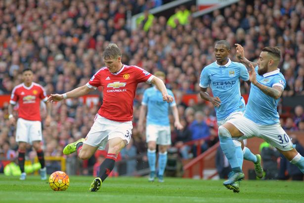 Bastian Schweinsteiger looks to pass the ball