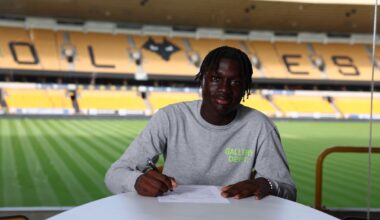 Mateus Mane signs his first professional contract with Wolves, aged 17 (Picture: Wolves)