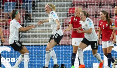 Julie Nelson celebrates her goal