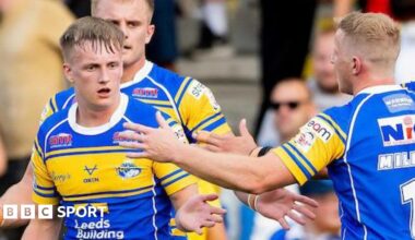 Leeds Rhinos winger Alfie Edgell is congratulated by team-mate Lachie Miller after scoring a try against Salford Red Devils.