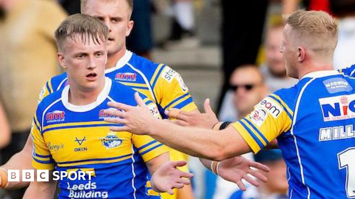 Leeds Rhinos winger Alfie Edgell is congratulated by team-mate Lachie Miller after scoring a try against Salford Red Devils.