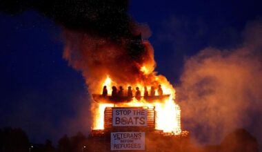 Burning of migrant boat effigy in Northern Ireland triggers police investigation