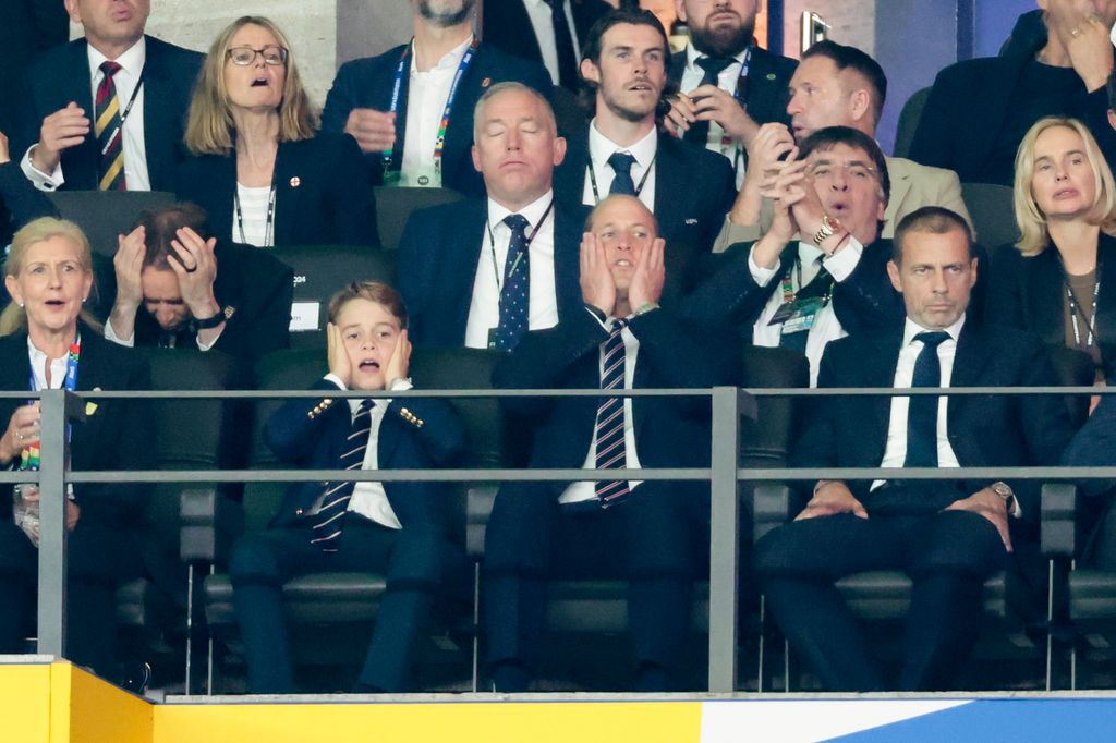 prince george and prince william watching football 