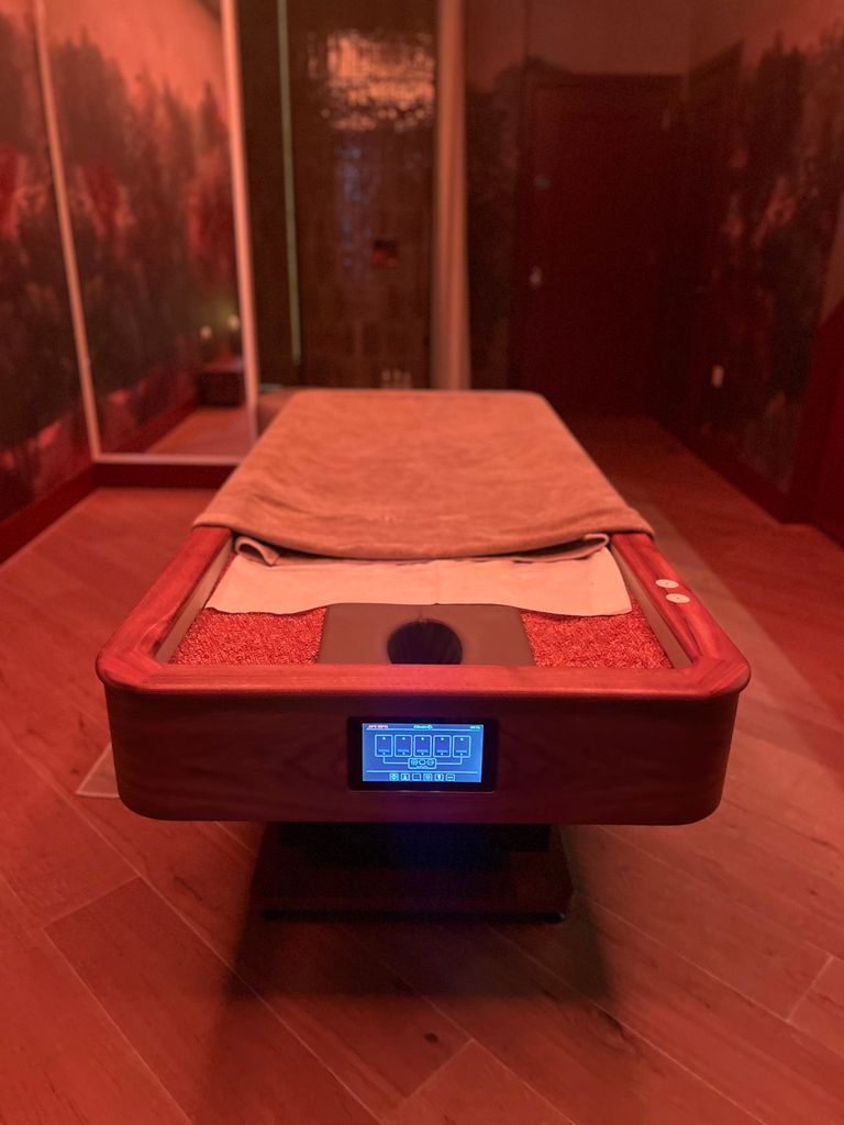 heated sand bed in treatment room