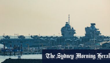 Britain warns on China, backs Australia