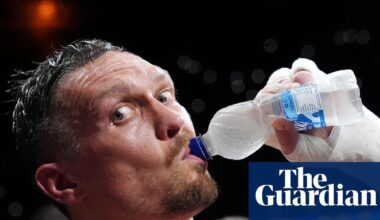 Oleksandr Usyk wraps Ukraine’s flag around himself and his fists around Daniel Dubois | Boxing