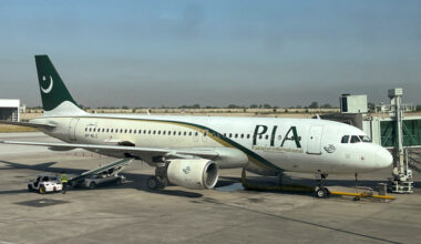 A view of a Pakistan International Airlines passenger plane, taken through a glass panel, at Islamabad International Airport in Pakistan Oct. 3, 2023. [REUTERS/YONHAP]
