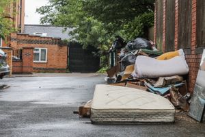 A dumped mattress in Birmingham after six months of bin strikes.