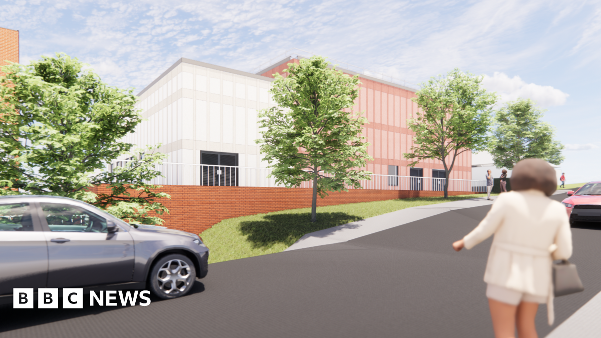An artist's impression of the new building. A white-coloured building is directly next to an oak-coloured building. There are cars and trees in the foreground.