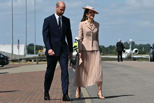 JUSTIN TALLIS/POOL/AFP via Getty Prince William and Kate Middleton upon arrival at RAF Northolt, west of London, on July 8, 2025