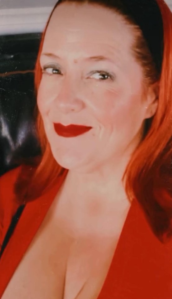 Portrait of Teresa Parent in a red dress.