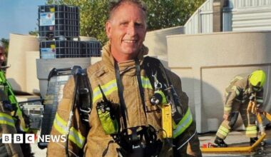 Peter Duncombe in his fire service uniform on his last call out on his last day as a retained firefighter