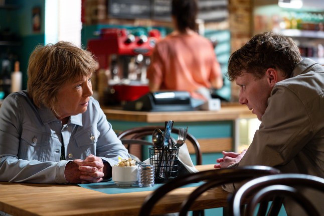 Julie talks to Jay in the cafe in EastEnders