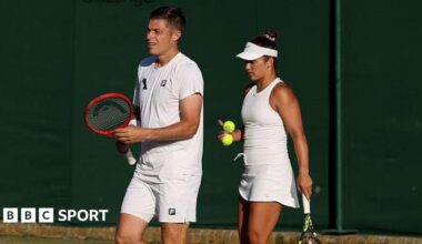 Neal Skupski and Desirae Krawczyk in action in mixed doubles at Wimbledon