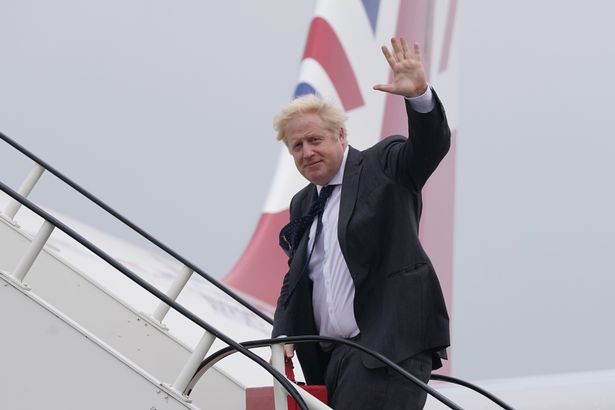 Former Prime Minister Boris Johnson boards the RAF Voyager ahead of trip to Washington in 2021