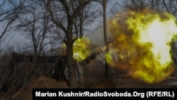 Ukrainian artillery crews fire a Paladin self-propelled howitzer near Chasiv Yar in February.