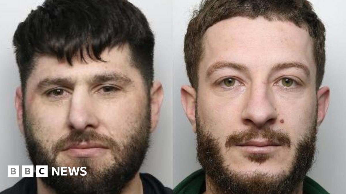 Two side by side police mugshots. Both have beards and moustaches, brown hair, and neutral expressions. Gjonaj, left, is squinting slightly and has brown eyes. His hair is slightly darker. Zefi has a neutral expression and green eyes.