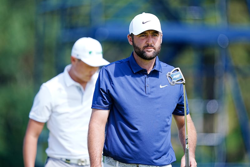 USA's Scottie Scheffler (right) on the third green during day four of The 153rd Open. Photograph: Peter Byrne/PA