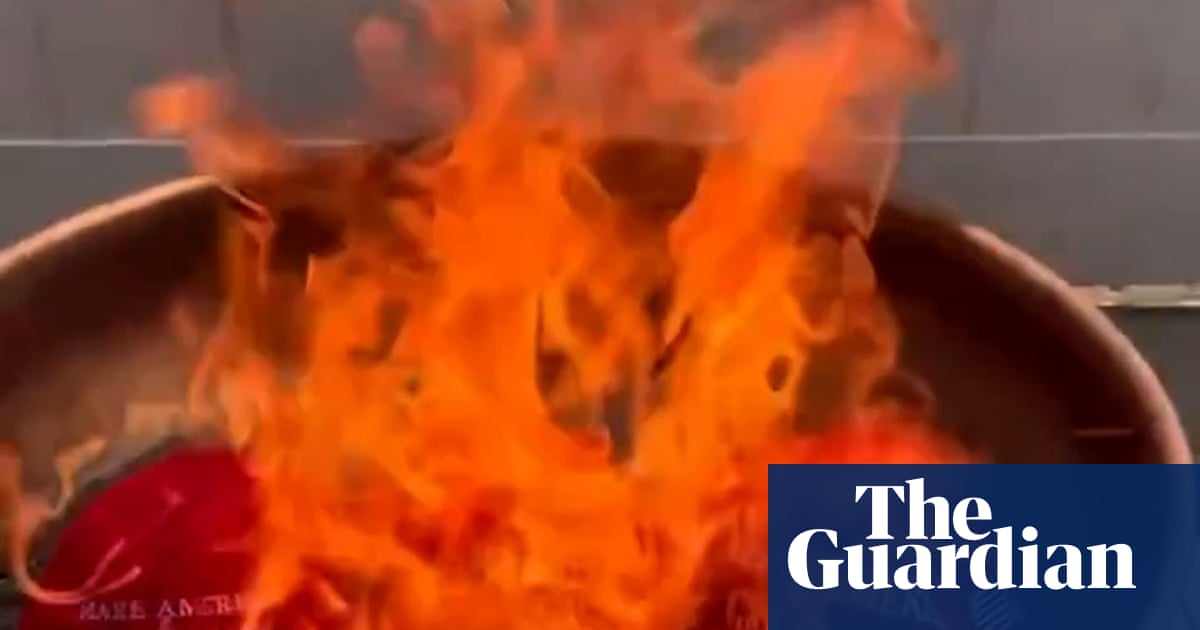 Trump supporters burn Maga hats after he dismisses Epstein files furor as ‘hoax’ | Jeffrey Epstein