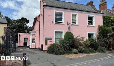 The pink exterior of the Luson surgery.