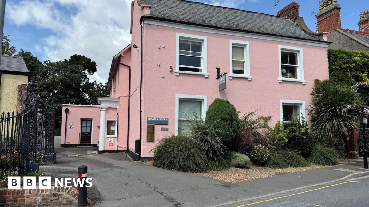 The pink exterior of the Luson surgery.
