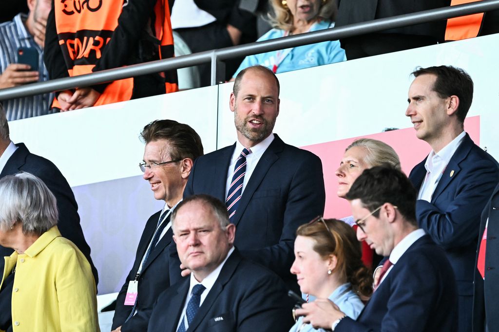 Prince William in a crowd of football fans