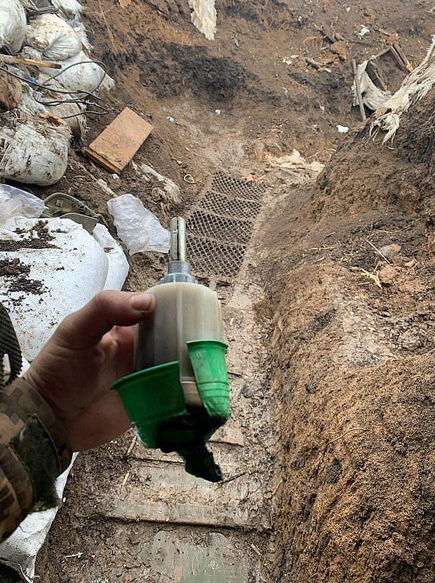 Ukrainian soldiers last year said Russian troops were dropping K-51 grenades (pictured), which according to experts are typically filed with tear gas
