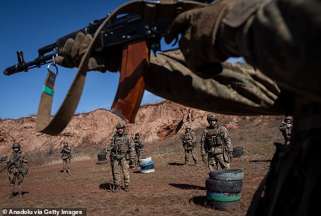 Ukrainian soldiers conduct combat drills, with troops reporting the use of tear gas to try and force soldiers out into the open