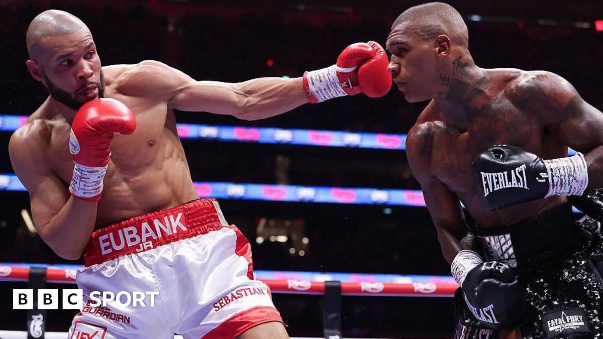 Chris Eubank Jr throws a left hook at Conor Benn