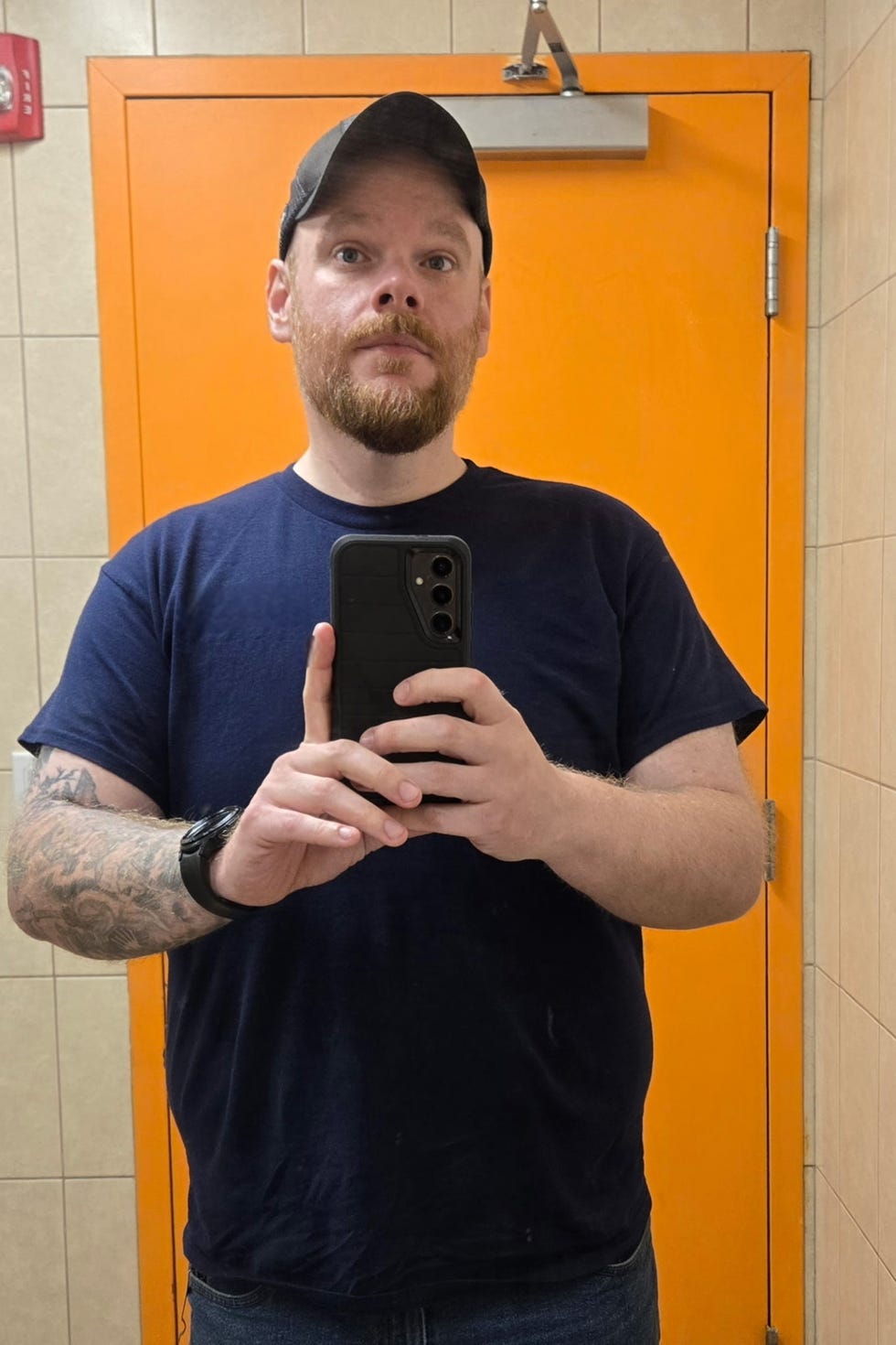 selfportrait in a bathroom setting highlighting a person taking a photo