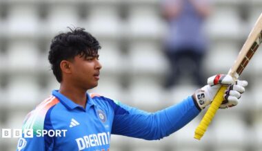 Vaibhav Suryavanshi raises his bat in recognition of his century