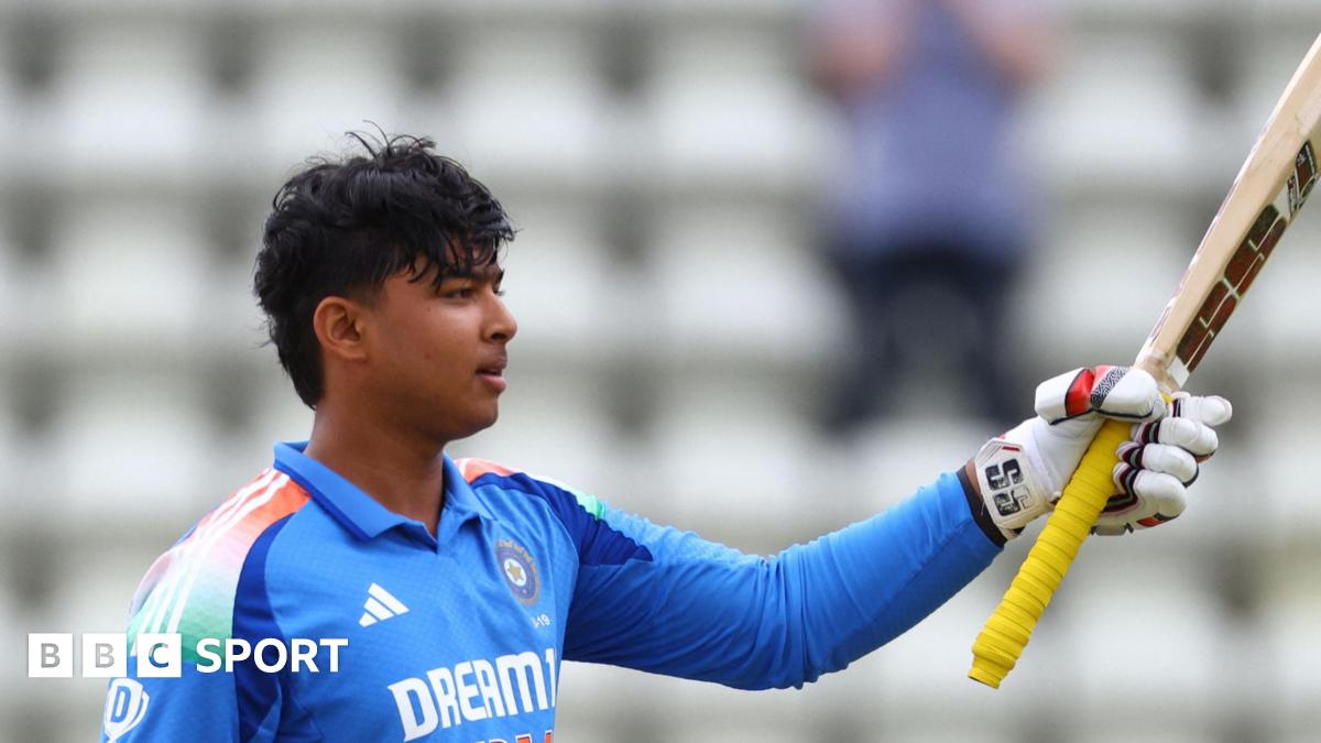Vaibhav Suryavanshi raises his bat in recognition of his century