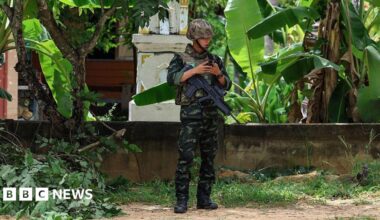 A Thai soldier stands guard in the Surin province on the border with Cambodia. Photo: 25 July 2025