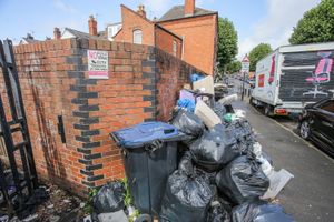 Bin bags piled high on a Birmingham street.