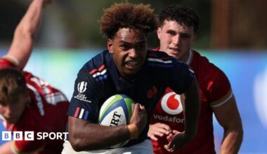 Simeli Daunivucu of France breaks away for a try