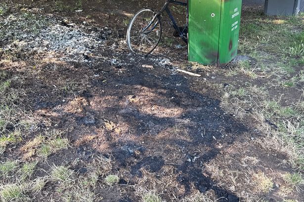 The charred remains of homeless man Dave's tent after it was destroyed in a suspected arson