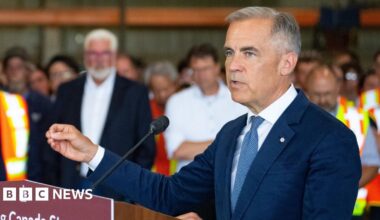 Mark Carney speaking to reporters in Hamilton