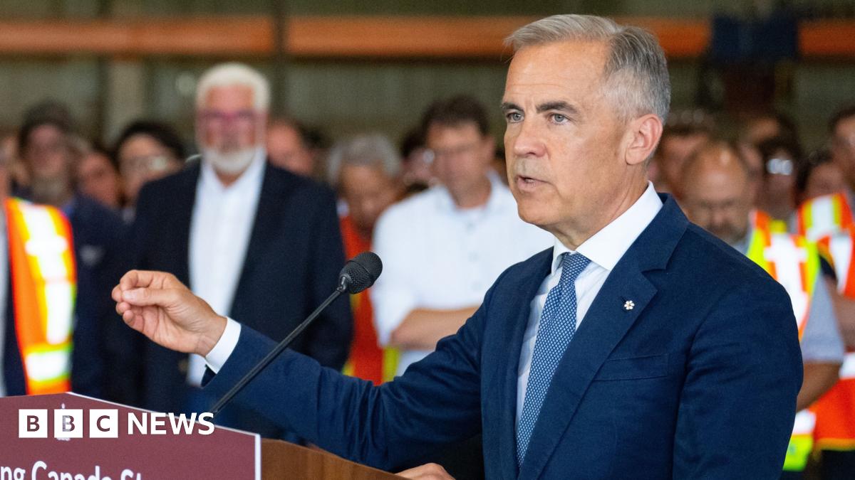 Mark Carney speaking to reporters in Hamilton