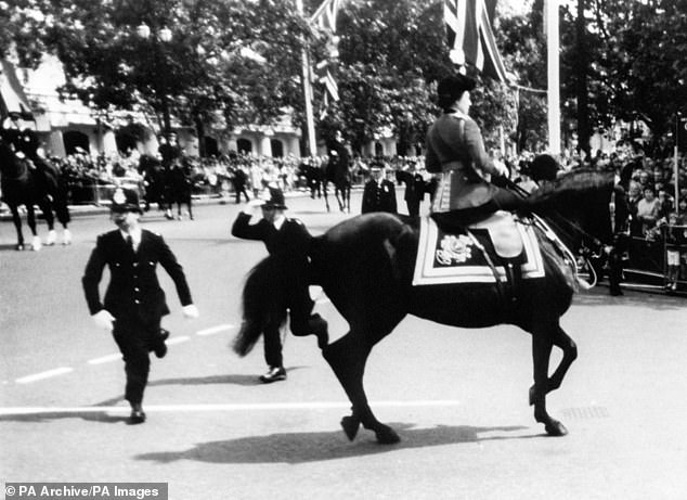 Shocking video footage from the 1981 attack during Trooping the Colour shows the Queen riding past well-wishers before the sound of gun fire erupts from the crowd spooking her horse